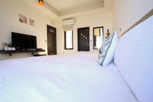Letto o letti in una camera di Water Ripple