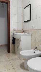 Ванная комната в Piso Geneto con garaje