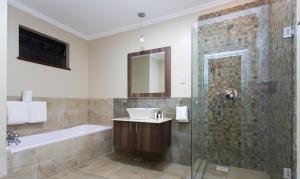 Vonios kambarys apgyvendinimo įstaigoje Cozy Residences by Trianum