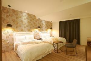 Llit o llits en una habitació de 大鵬灣瞭望台 Top Bay B&B