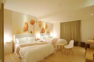 Llit o llits en una habitació de 大鵬灣瞭望台 Top Bay B&B