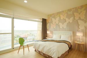 Llit o llits en una habitació de 大鵬灣瞭望台 Top Bay B&B
