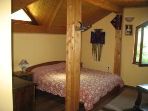 Llit o llits en una habitació de Guest House Slivek
