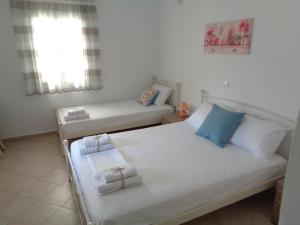 A bed or beds in a room at Studio near the sea