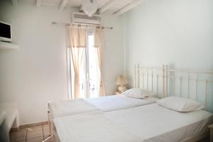Postel nebo postele na pokoji v ubytování Altana Boutique Hotel