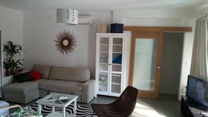 TV a/nebo společenská místnost v ubytování Holiday Homes Mare