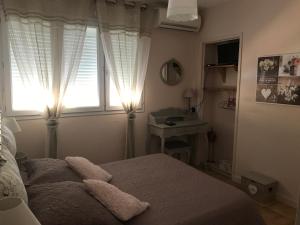Postel nebo postele na pokoji v ubytování Chambre d'hôtes Costa Belle