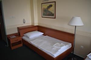 Postel nebo postele na pokoji v ubytování Paprika Panzió