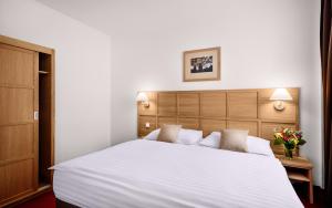 Posteľ alebo postele v izbe v ubytovaní Central Hotel Prague
