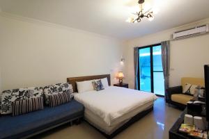 Letto o letti in una camera di Water Ripple
