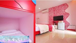 Krevet ili kreveti u jedinici u okviru objekta Zhen Ai B&B