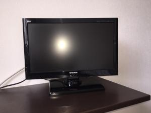 TV a/nebo společenská místnost v ubytování Atsugi Hotel Yugiri