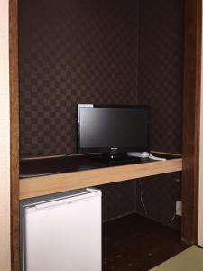 TV a/nebo společenská místnost v ubytování Atsugi Hotel Yugiri