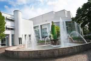 a water fountain in front of a building at Elite Park Hotel in Växjö