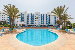 Bazén v ubytování Oasis Hotel & Spa nebo v jeho okolí