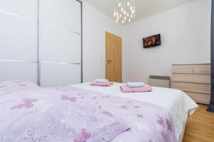 Postel nebo postele na pokoji v ubytování Apartman Duje