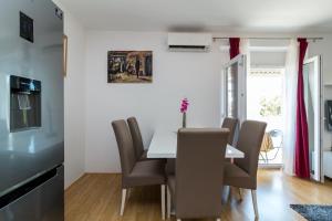TV a/nebo společenská místnost v ubytování Apartman Duje