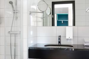 Koupelna v ubytování Comfort Hotel Göteborg
