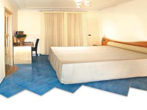 Posteľ alebo postele v izbe v ubytovaní Il Principe Resort