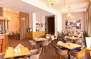 Reštaurácia alebo iné gastronomické zariadenie v ubytovaní Central Hotel Prague