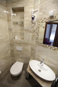 Vannituba majutusasutuses Apis Hotel