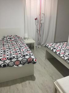 Postel nebo postele na pokoji v ubytování Apartment Paulina