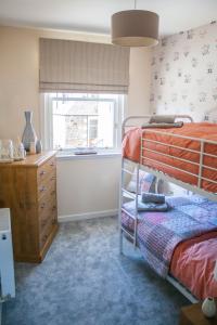 Postel nebo postele na pokoji v ubytování Lexington Apartments