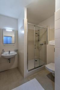 Koupelna v ubytování Hotel Taurus