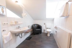 Koupelna v ubytování Hotel Palko