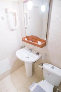 A bathroom at Creta Aquamarine Hotel