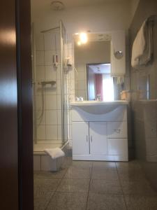 Een badkamer bij WH Monteurhotel Papenburg Nord