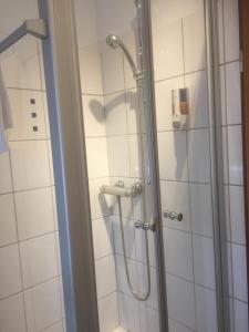 Ett badrum på WH Monteurhotel Papenburg Nord