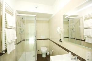 Koupelna v ubytování Hotel Nuvola