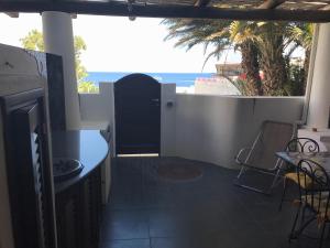 a balcony with a view of the ocean at Casa Lorenzo in Stromboli