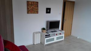 Televízia a/alebo spoločenská miestnosť v ubytovaní Cal Jordi, Fulleda