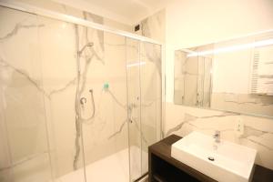 Koupelna v ubytování Hotel Nuvola