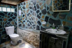 Koupelna v ubytování Sabai Corner Bungalows - SHA Extra Plus