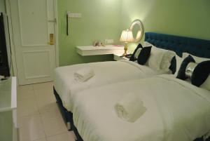 Postel nebo postele na pokoji v ubytování 1 Day Car Hotel Station 18