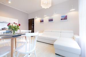 Posedenie v ubytovaní Apartamenty City.
