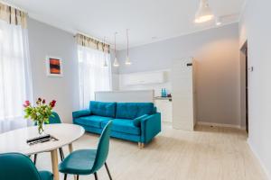 Posedenie v ubytovaní Apartamenty City.