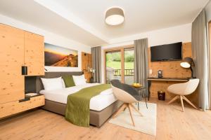 Postel nebo postele na pokoji v ubytování Aktiv Panoramahotel Daniel
