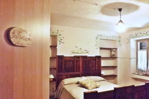 A bed or beds in a room at Poderi Sartoris