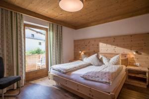Posteľ alebo postele v izbe v ubytovaní Apart Dengg