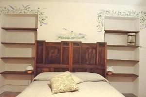 A bed or beds in a room at Poderi Sartoris