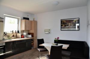 Kuchyň nebo kuchyňský kout v ubytování Ferienhaus "Am Gutspark"