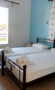 Galini Hotel Bed and Breakfast客房内的一张或多张床位