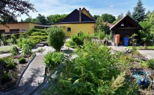 Zahrada ubytování Ferienhaus "Am Gutspark"