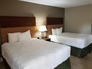 Cama o camas de una habitación en Stayable Gainesville