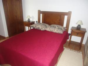 Uma cama ou camas num quarto em Alojamento Rural Casa da Eira