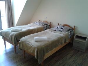 Rúm í herbergi á Mestiatour Guest House